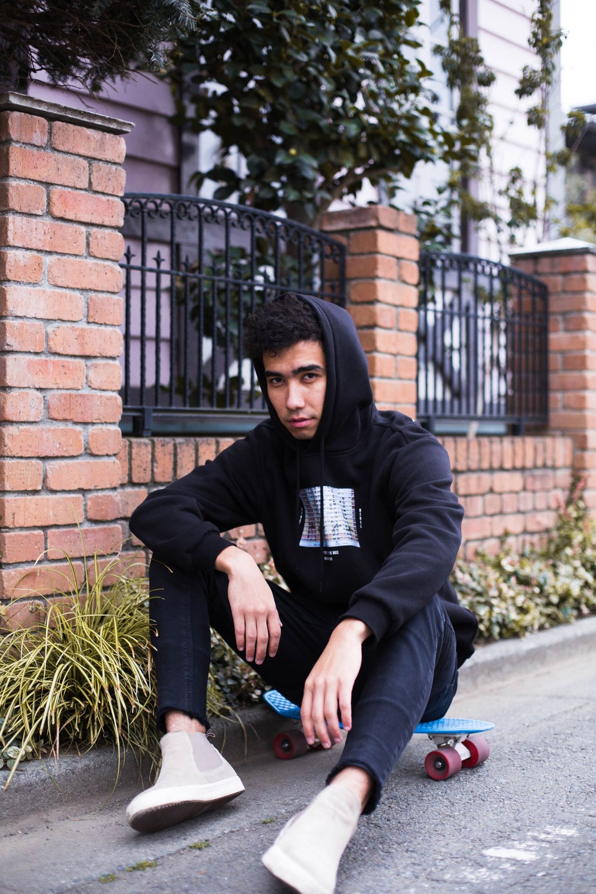 Rider in a hoodie on a skateboard