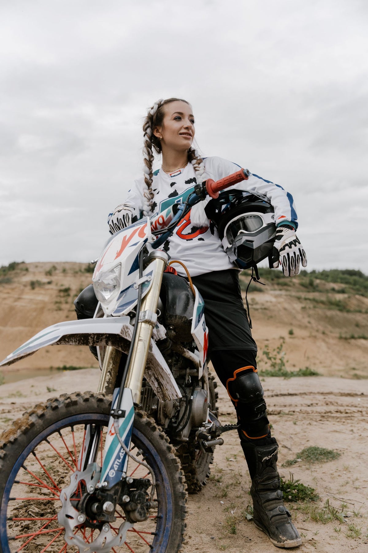 Woman rider with her dirt bike
